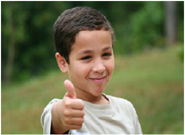 Image of boy with thumbs up